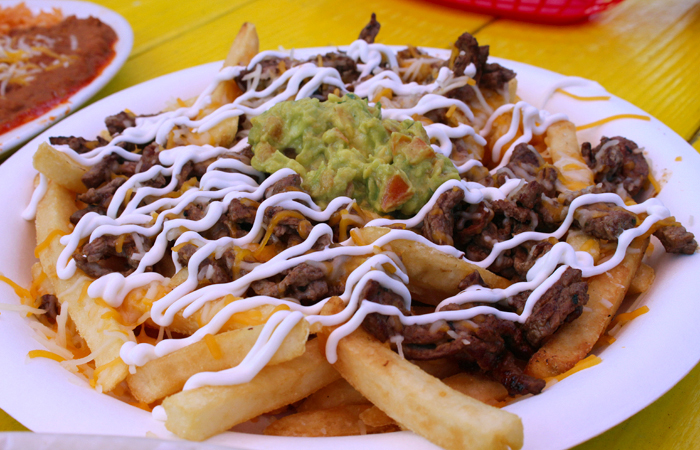 One of my new favorite dishes is the asada fries ($12). Loaded with grilled steak, sour cream, cheese and guacamole, this is perfect for a table of three or four to share. 