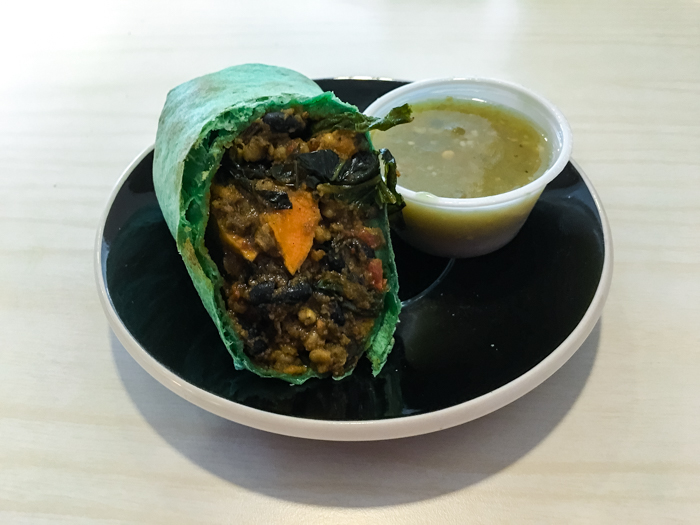 The breakfast burrito ($7.50) changes often, but consistently includes a healthy dose of legumes, sweet potatoes, kale, peppers and side of organic salsa verde. This is one cut in half. 
