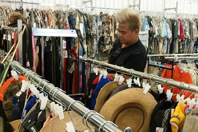 Zamora searches for treasures at the Pearl City Goodwill.
