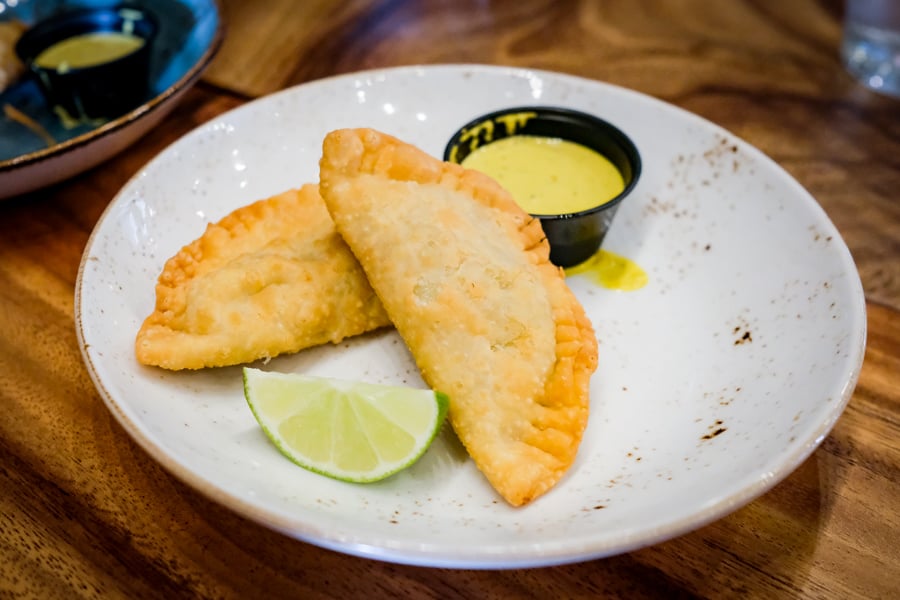 The cheese empanadas are killer. Just don't forget to dip into the creamy aji sauce. 