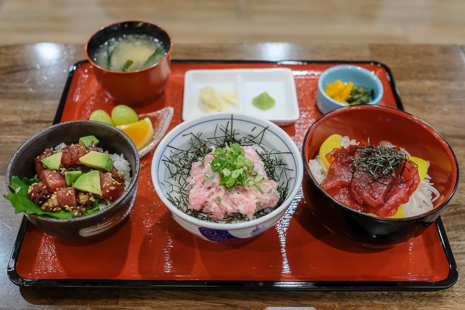 Maguro (ahi tuna) Zanmai set features three rice bowls topped with ahi limu poke, negitoro and maguro zuke