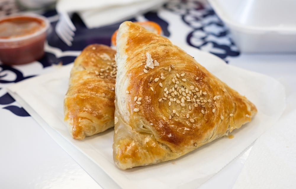 The somsa ($5.45 for two) is a delicious savory pastry filled with beef and minced onions. 