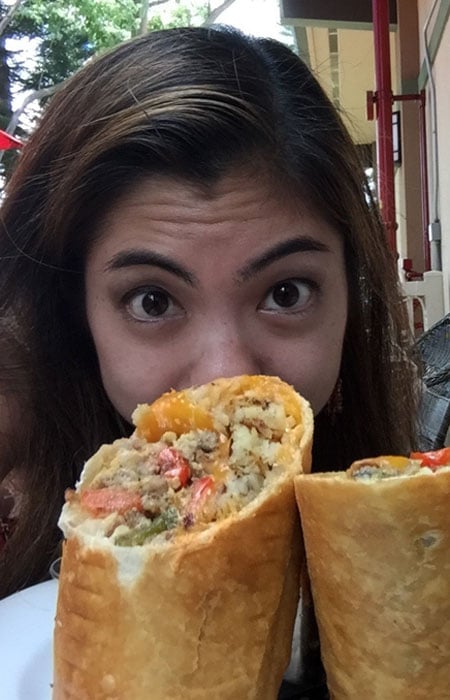 Half of the burrito, in proportion to my face. A $13 well spent.