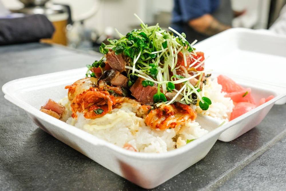 The kimchee ahi poke bowl is another towering creation with  cubed ahi, wasabi aioli, and thick pieces of napa cabbage kimchee. 