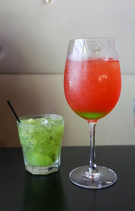 The kiwi capriosca ($8, left) is a refreshing cocktail of fresh kiwi, lime, simply syrup, vodka and midori. The jolly bear ($8, right) is a sweet cocktail of Absolut berry acai, Kai lychee, midori, peach schnapps, pineapple, cranberry, lime and club soda.