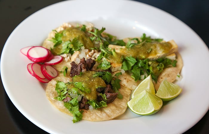 The Dumb Coq debuted at First Friday with free tacos. The tacos ($7 for an order of 3) are now an appetizer on the menu and include a mouthwatering salsa verde with a nice zing.