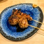 Tare tsukune (minced chicken meatball) and seseri (chicken neck) Yakitori Ando