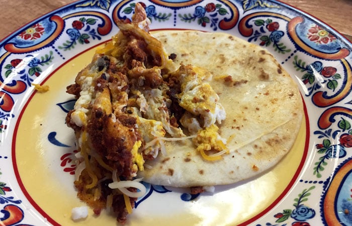 The early bird gets the deal: breakfast tacos are only $2 each if you come from 7-8 a.m. Barrio’s breakfast tacos feature a petite flour tortilla, scrambled eggs, shredded cheese and either machaca (marinated shredded beef) or chorizo.