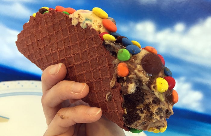 Ice cream tacos come with any three scoops of ice cream and three toppings of your choice. Pictured: chocolate chip cookie dough, Kona Coffee chocolate pie and cookies & cream ice cream topped with M&Ms, Reese’s pieces and Nutella drizzle.
