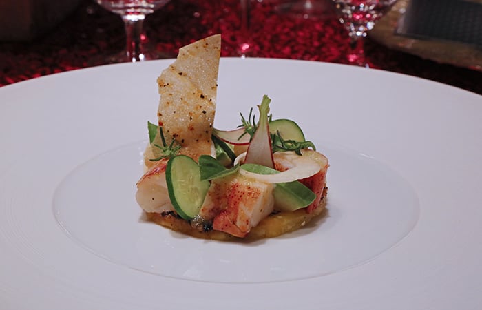Third course, chilled Maine lobster with hearts of palm, local avocado, charred Maui pineapple and vanilla essence paired with a 2007 La Viarte Bianco delle Venezie 'Sium' from Friuli, Italy. Michael Mina, Mina Group, San Francisco.