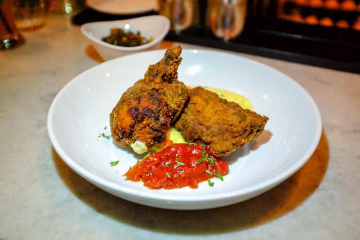 The Fried Chicken ($27) entree is hearty enough for two, but once you build the perfect bite of juicy chicken, crispy skin, a dollop of cheesy grits and a streak of tomato jam, it becomes clear that sharing is a mistake. This dish is last meal on Earth material. 