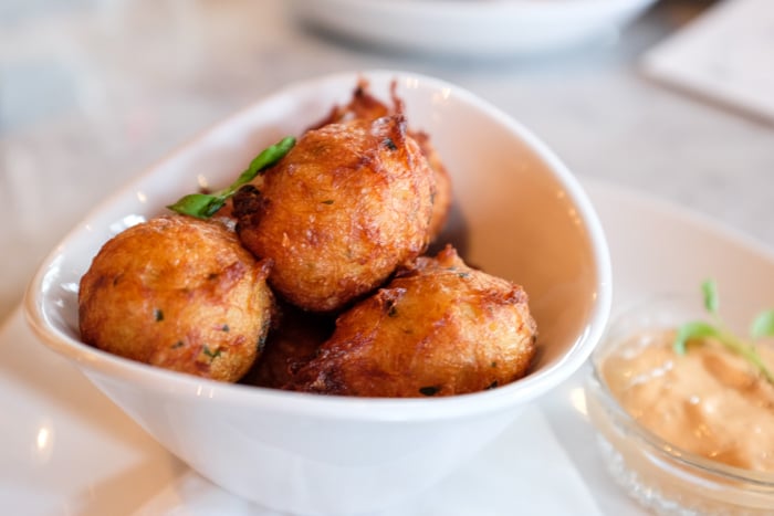 You can't eat just one fluffy Black Cod Bacalao Fritter ($12); it's because of the harissa aioli they're served with. 