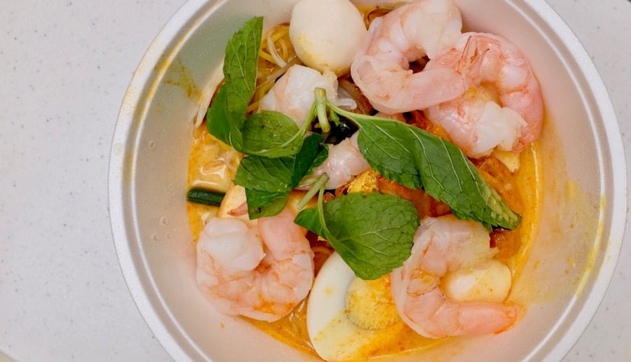colorful bowl of laksa noodle soup