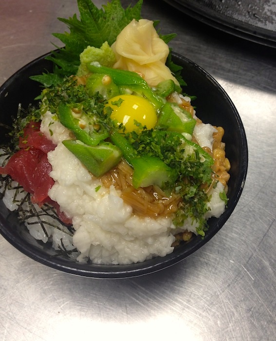 Domburi rice bowl topped with natto, grated mountain yam, okra, ahi, quail egg