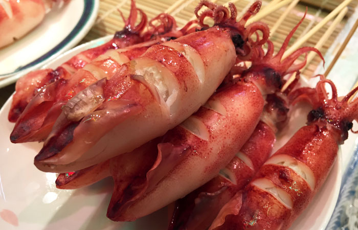 I couldn’t bring myself to actually buy one, but I saw tons of locals and tourists walking around with these squid and octopus skewers.