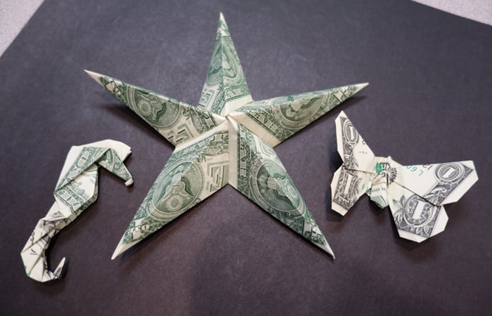 Fancy tips: Origami seahorse, star, and butterfly from dollar bills.