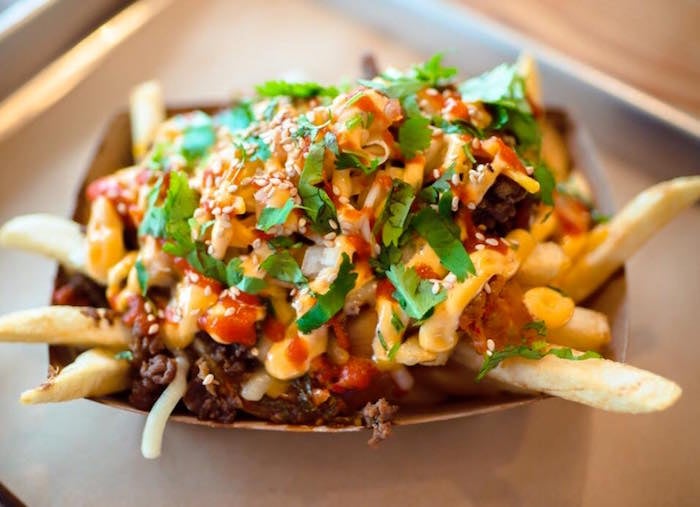 Maui-Fresh-Streatery-Gangnam-Fries_Crispy-crinkle-cuts-kalbi-beef-Kim-Chee-aioli-fried-garlic-Korean-nori-and-scallions