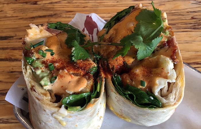 Lobster breakfast burritos comprise eggs, bacon, cheese, veggies and a generous portion of lobster.