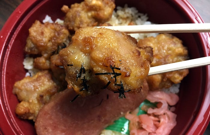 The garlic chicken donburi comes with spam and shredded nori over rice.
