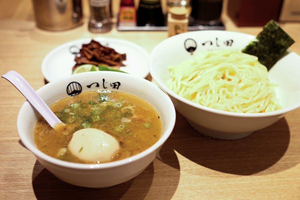 The regular ajitama tsukemen ($12.98 or $11 with kamaaina discount) includes thin strips of chashu pork, menma (bamboo shoots) and a marinated soft boiled egg. A smaller portion of noodles can be had for a dollar less. 
