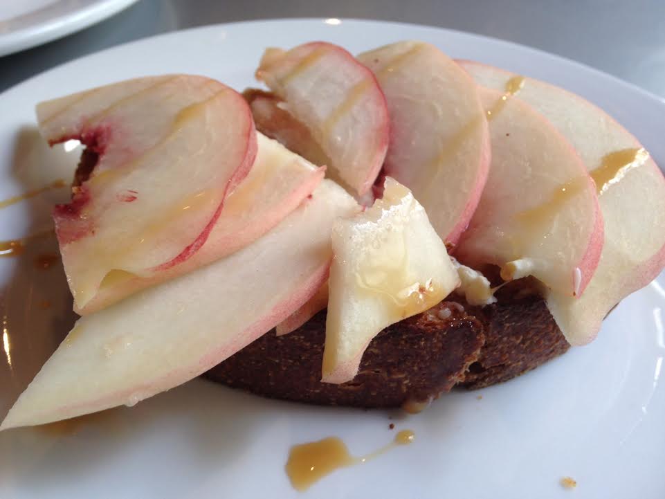 Brie and white peach drizzled with caramel
