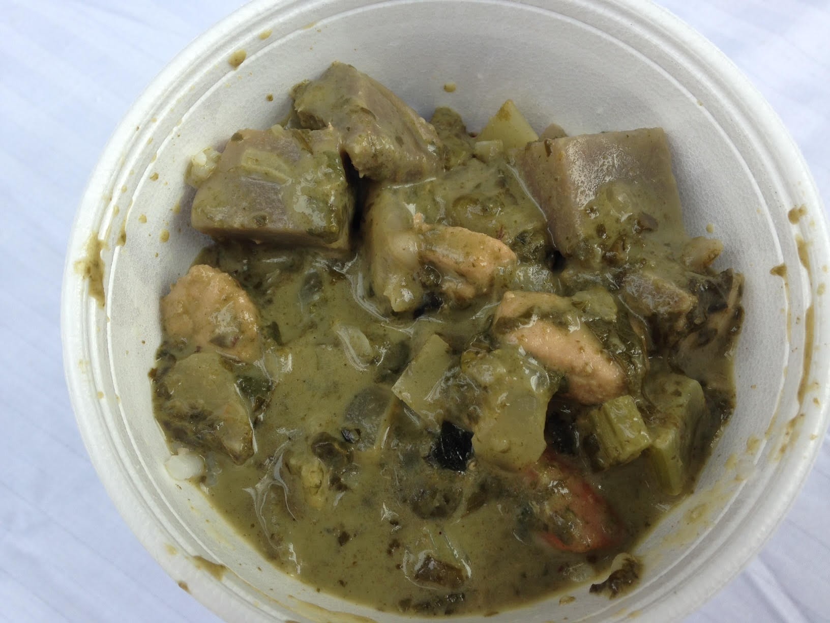 Seafood taro chowder with luau leaf and coconut milk.