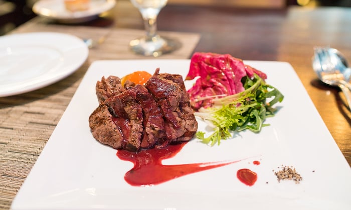Wagyu Filet Mignon - Grilled Wagyu fillet, red wine beet sauce ($48)