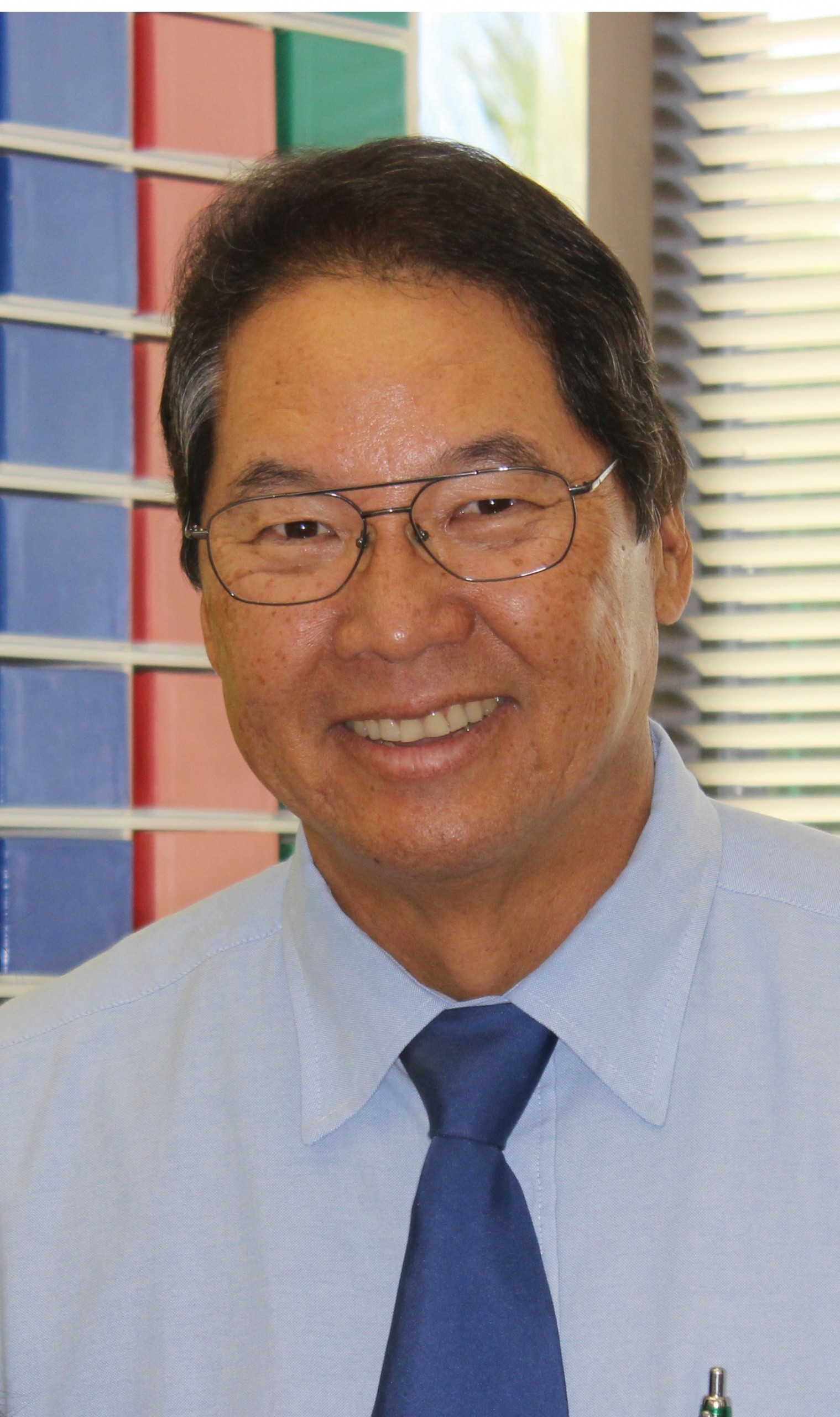 Curtis N. Kamisugi, D.D.S., M.S.D.