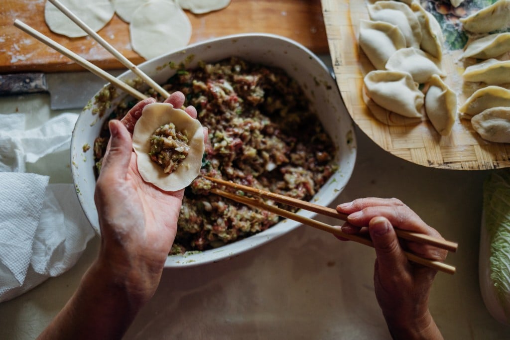 Making dumplings by Frank Zhang via Unsplash