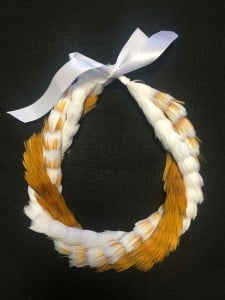 Kawika Lum-Nelmida weaves feathers into works of art. Photo: Courtesy Pai Foundation