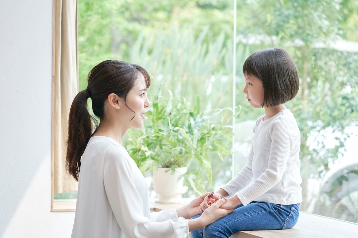 Asian Mother Talking With The Daughter