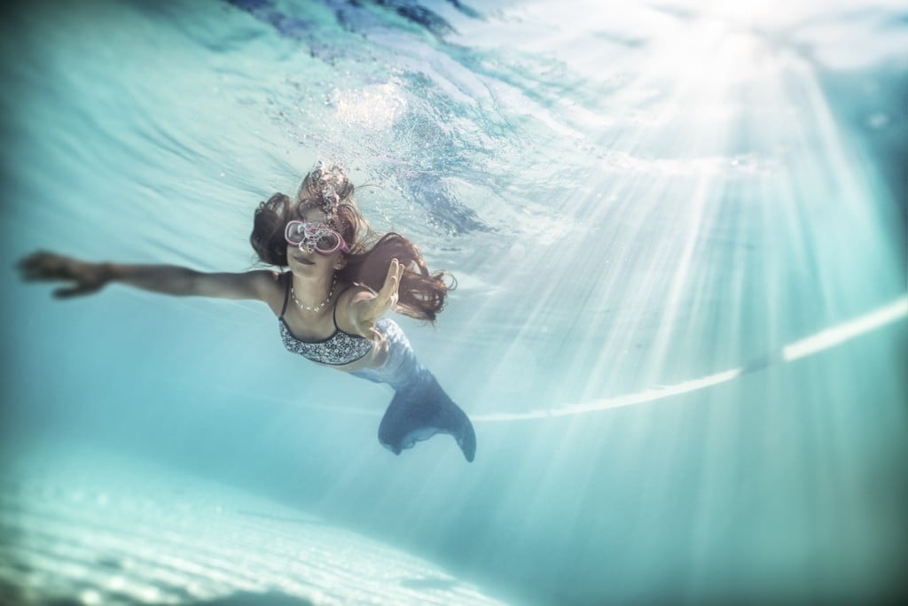 Little Mermaid Swimming Underwater.