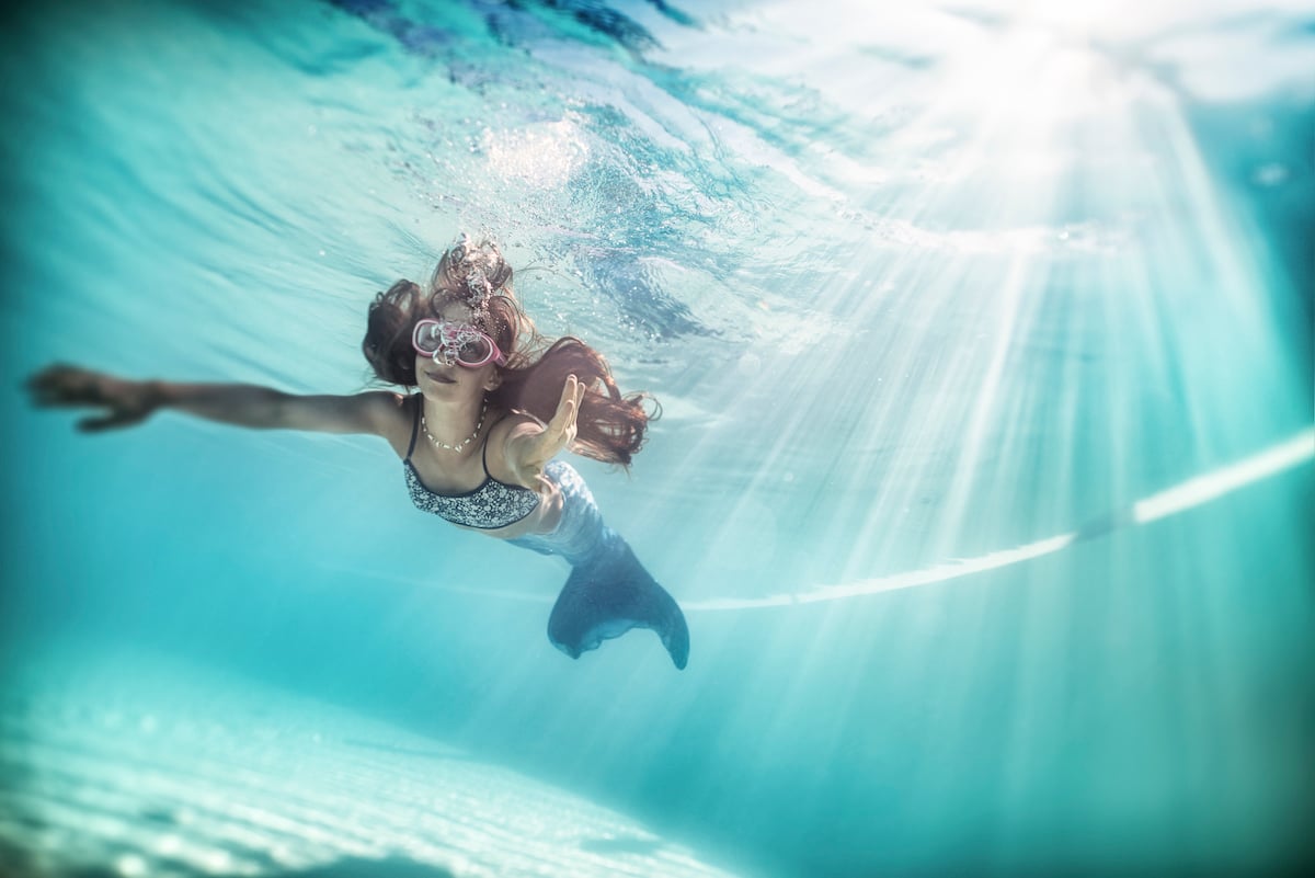 Little Mermaid Swimming Underwater.