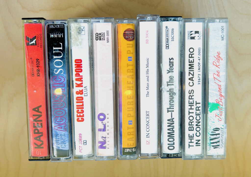 Old cassette tapes featuring classic Hawaiian musicians and music.