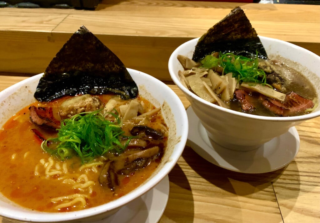two bowls of ramen with vegetables and nori