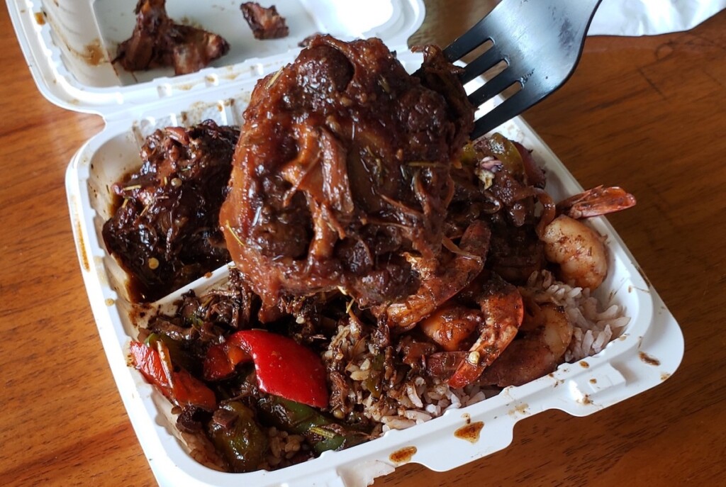 overflowing clamshell of jamaican Oxtail