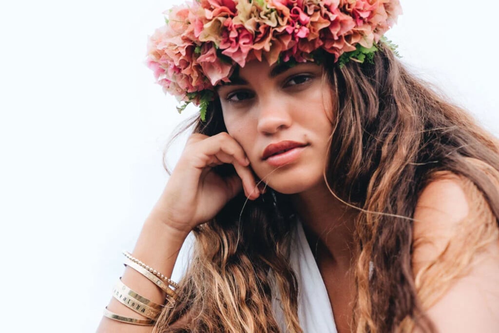 woman wearing gold bracelets