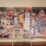 bench in front of large poster