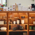 glass case holding dishware