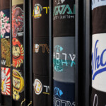 t-shirts in wall display