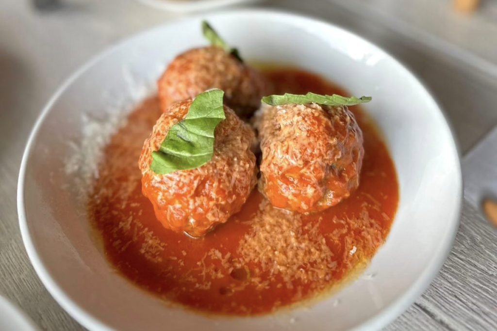 trio of meatballs in marinara sauce