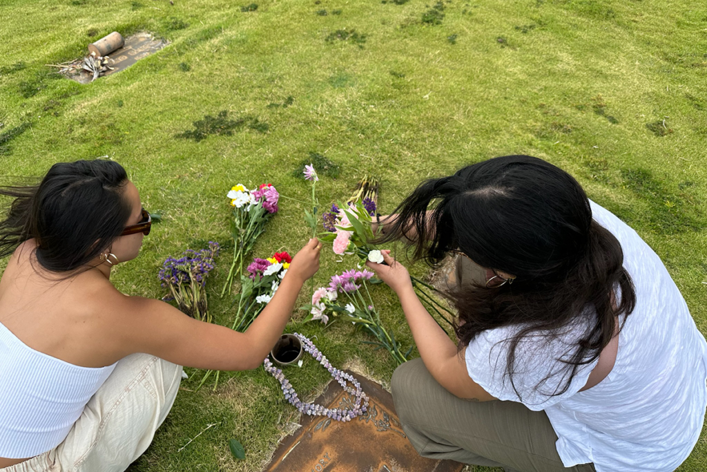 Hailey And Rylie Leaving Flowers For Their Great Grandparents And Uncle