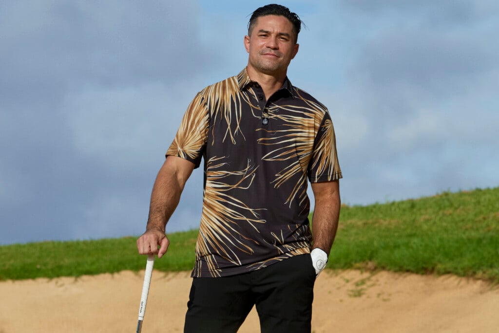 man standing on golf course