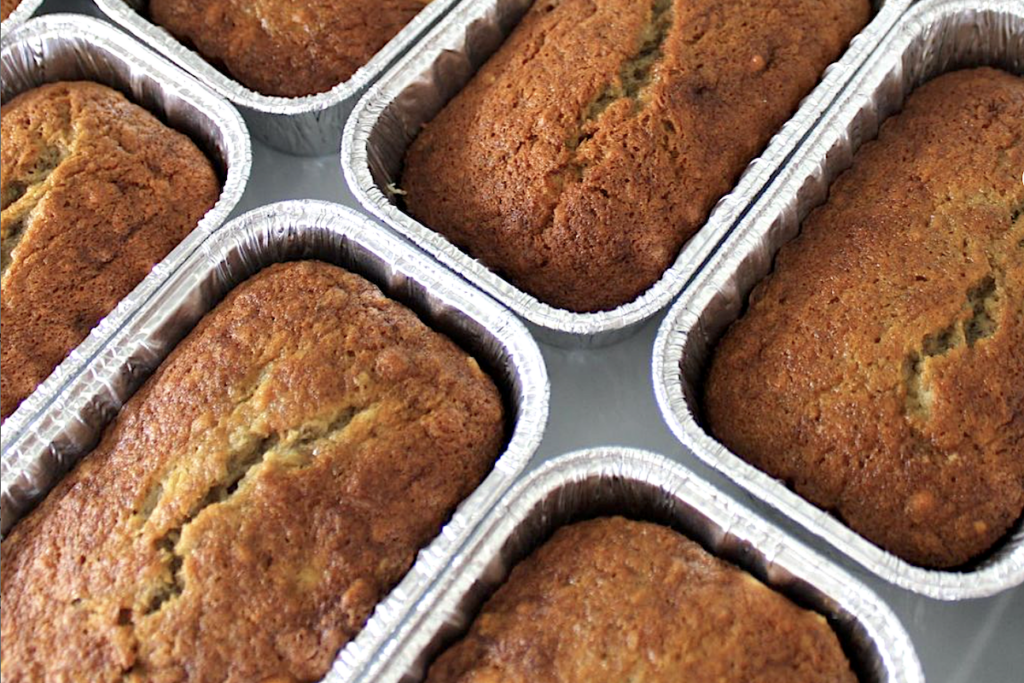 Banana Breads lined up in baking tins