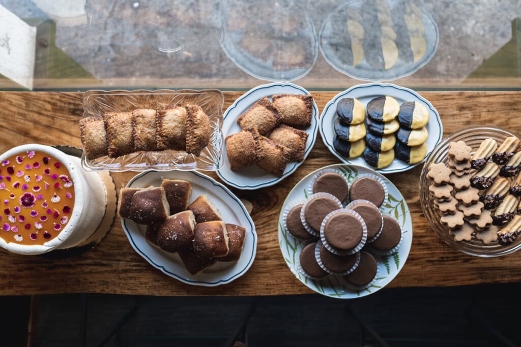 a selection of baked goods, cakes and cookies on a wood counter at Mille Fête in Chinatown Honolulu.