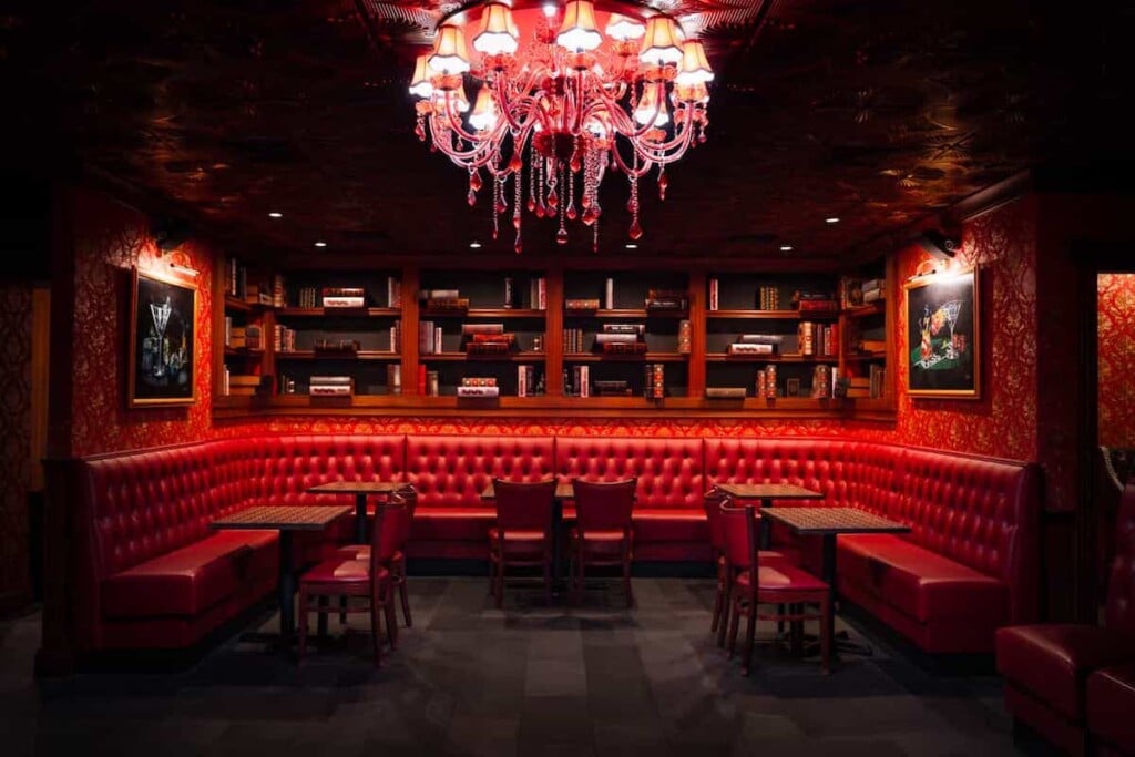 dimly lit bar and tables at steakhouse
