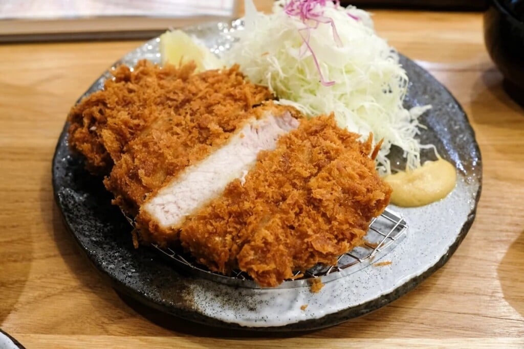 Tonkatsu on a plate with shaved cabbage