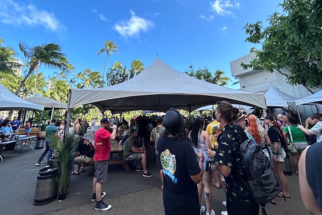 crowds under tents and blue skies at Waikiki Brewers Festival