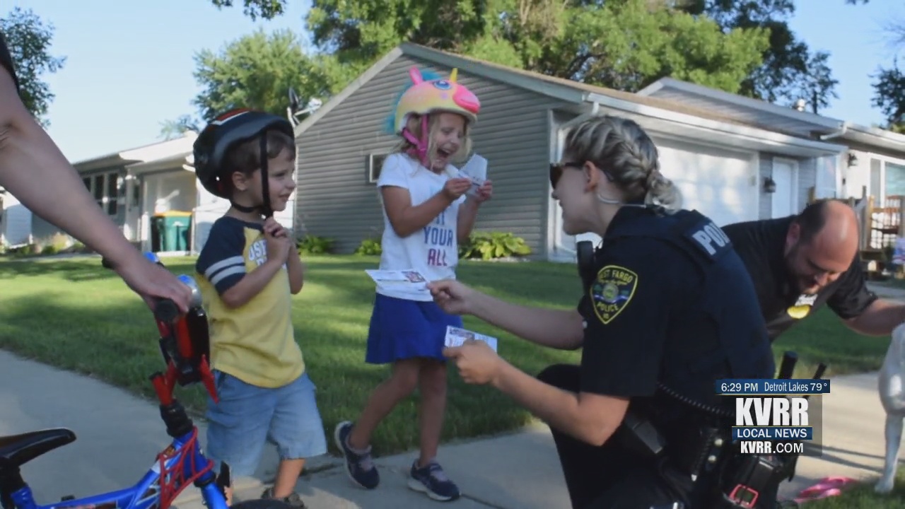 West Fargo Police give out ice cream citations to kids wearing helmets ...