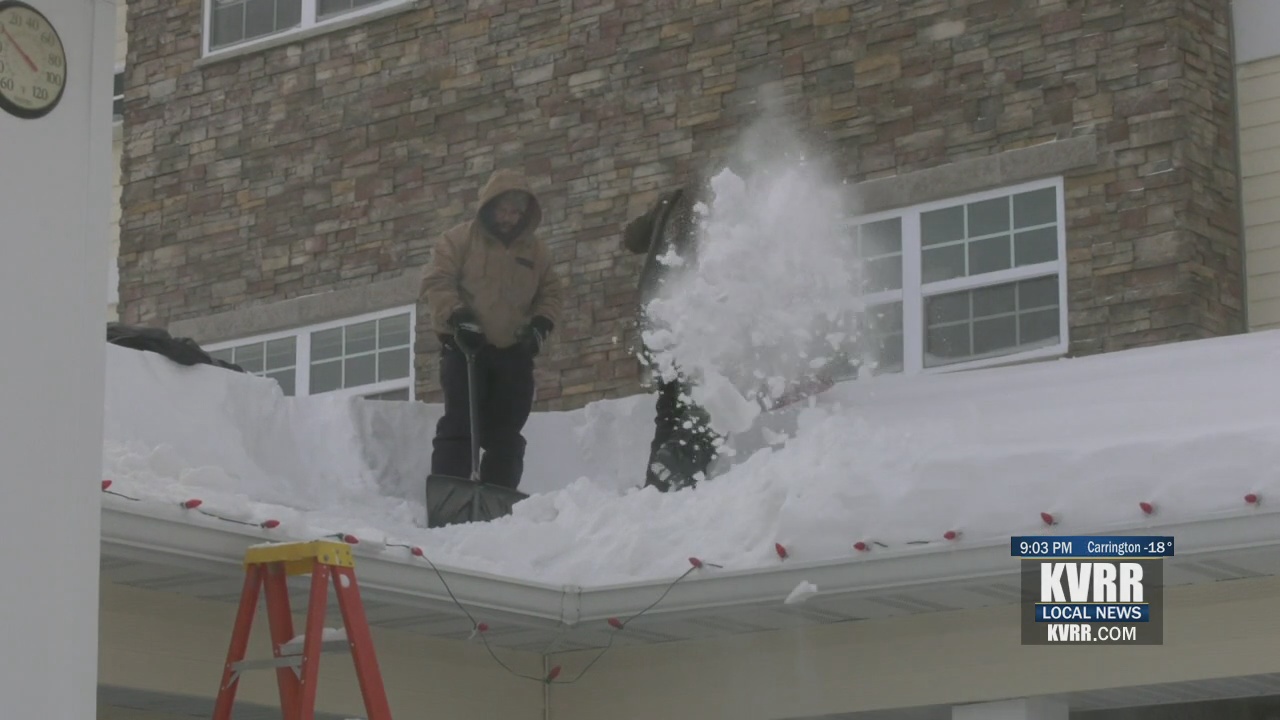 Clearing snow from your roof is important to prevent ice dams KVRR